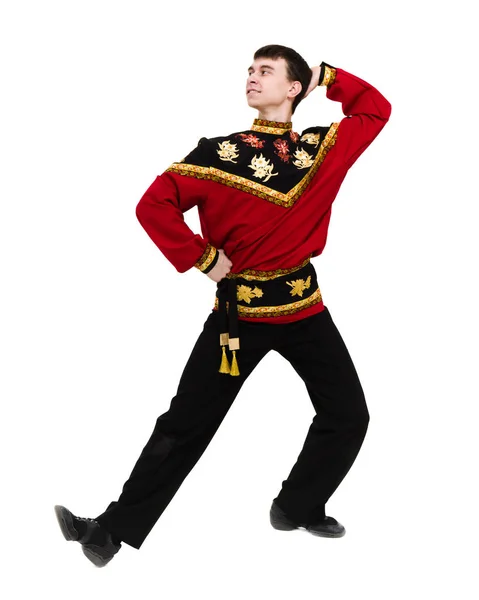 Молодий чоловік в народному російському костюмі позує — стокове фото