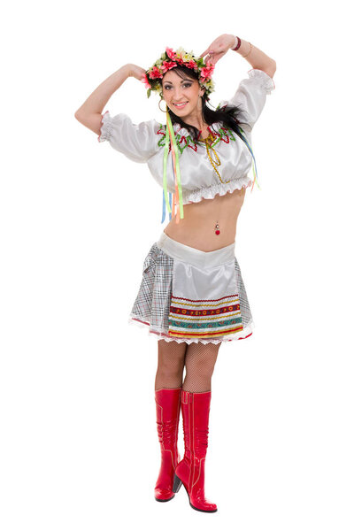 girl in polish national traditional costume posing, full length portrait against isolated white