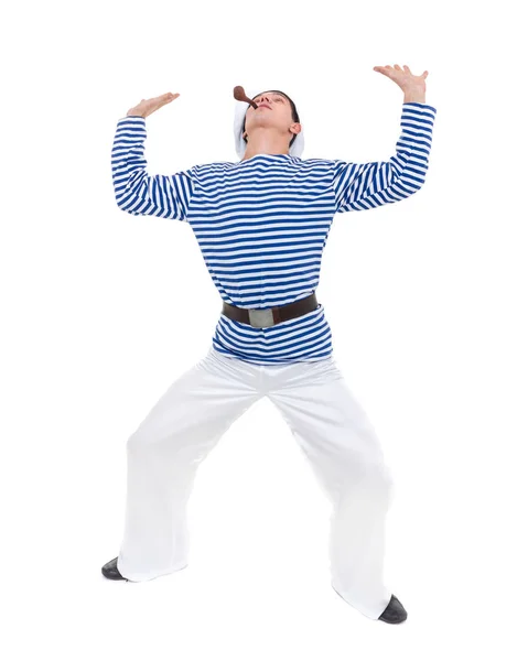 Jonge danseres man verkleed als een zeeman poseren tegen geïsoleerde wit in volle lengte. — Stockfoto