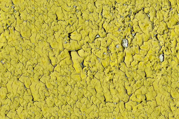 油漆剥落上墙无缝纹理。模式的质朴的黄色垃圾材料. — 图库照片