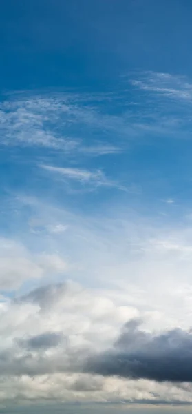 Fantastic clouds against blue sky, panorama — Stock Photo, Image