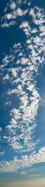 Fantastic clouds against blue sky, panorama — Stock Photo, Image