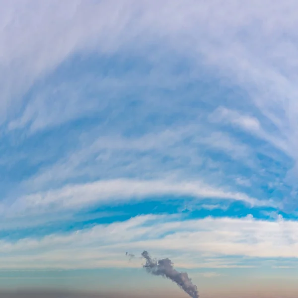 Fantastic clouds against blue sky — Stock Photo, Image