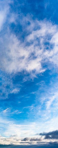 Fantastic soft clouds against blue sky, natural composition