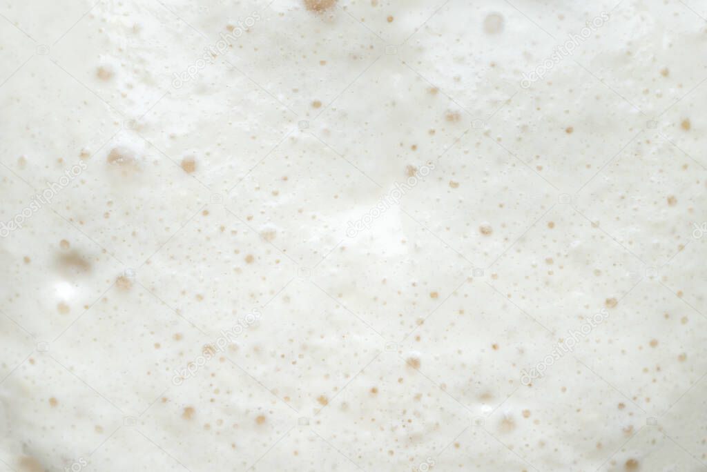 The surface texture of the dough is yeast dough, background.