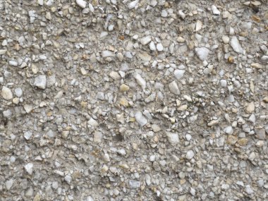 Mermer parçalı gri beton doku.