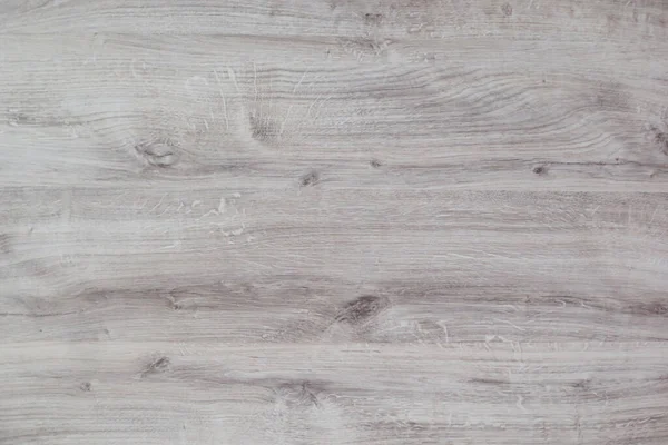 Grey laminate with wood texture.