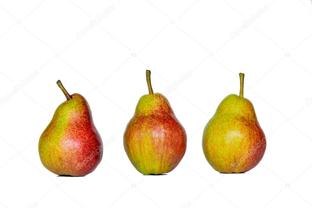Three fresh yellow red pears.