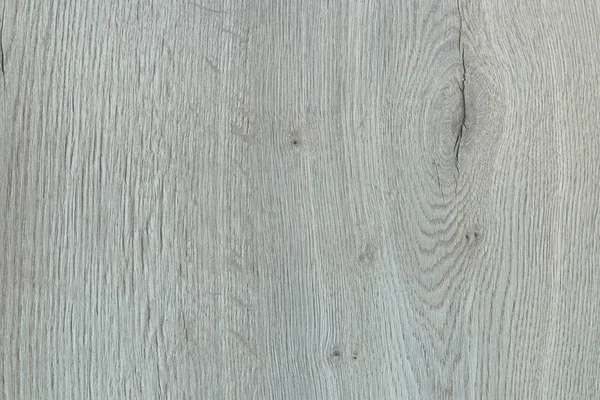 Laminated panel with grey wood texture.