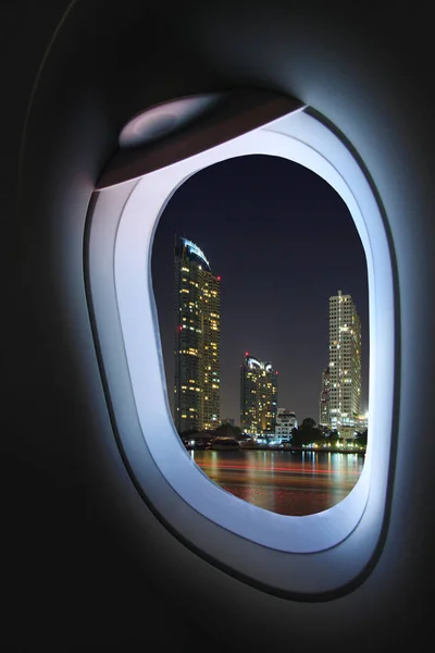 Plane window and view from plane to someplace, plane window with view of people in journey to someplace, plane view and plane window background from the sky, travel business with plane of travel trip.