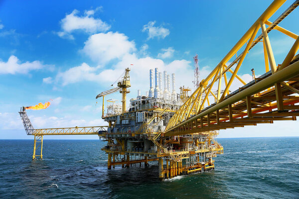 Offshore construction platform for production oil and gas. Oil and gas industry and hard work industry. Production platform and operation process by manual and auto function from control room.