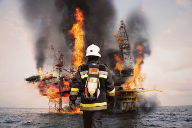 Firefighter in oil and gas industry with mission successful for protect with emergency case or worst case, Personal protective equipment of firefighter team and teamwork for danger mission. clipart
