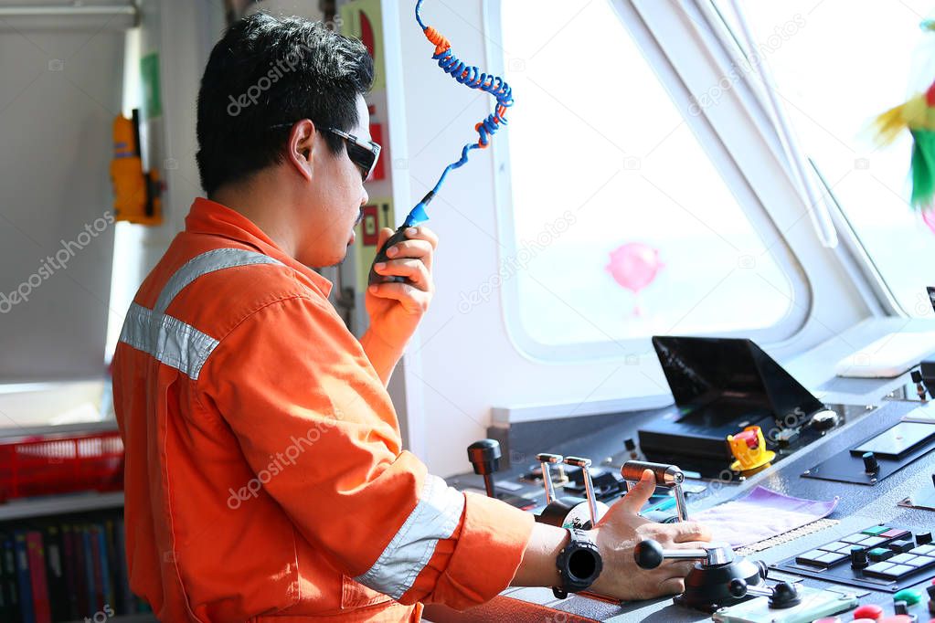 operator recording operation of oil and gas process at oil and rig plant, offshore oil and gas industry, offshore oil and rig in the sea, operator monitor production process, routine daily record.