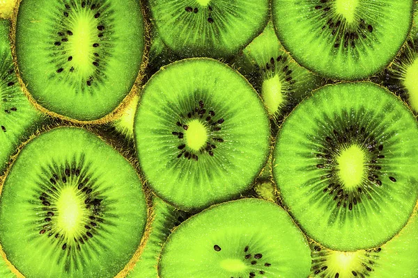 Fundo kiwi frutas fatias — Fotografia de Stock