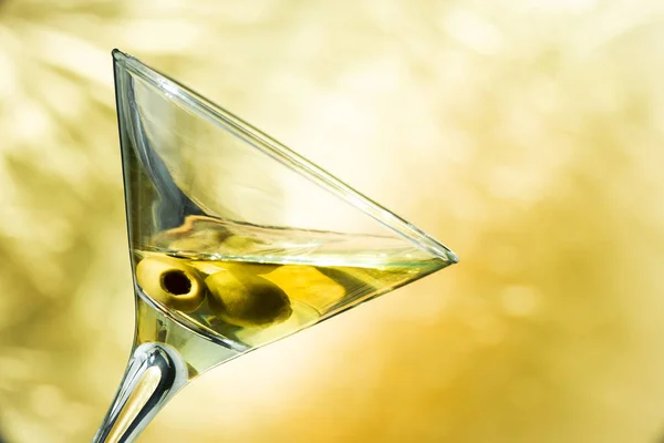 A martini glass with olives — Stock Photo, Image