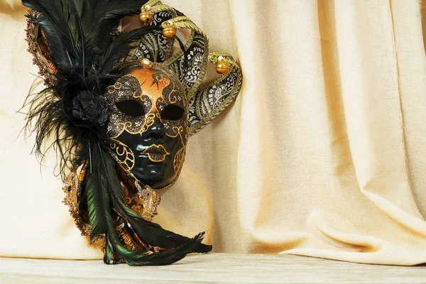 Venetian mask on a background of a light cloth — Stock Photo, Image