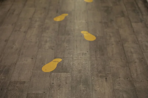 Fußabdrücke auf dem Fußboden — Stockfoto