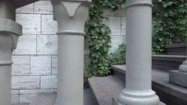 Camera Moves Marble Steps Columns Form Pillars Wall Covered Ivy — Stock Video