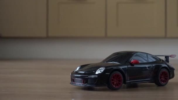 Toy car on the remote control — Stock Video