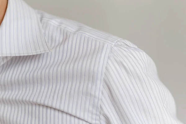 Leche y cuello de una camisa blanca representativa — Foto de Stock
