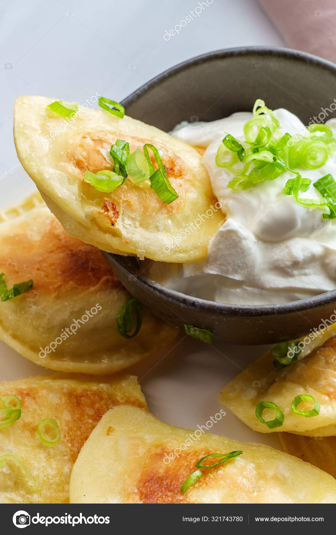 Polish Pierogies Sour Cream — Stock Photo © ezumeimages 321743780