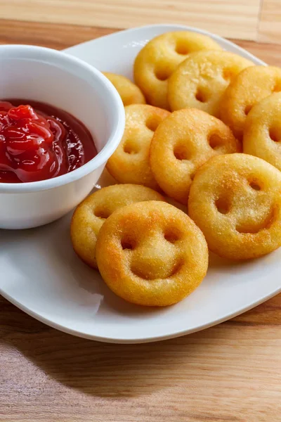 Sorrisi di patate fritte francesi — Foto Stock