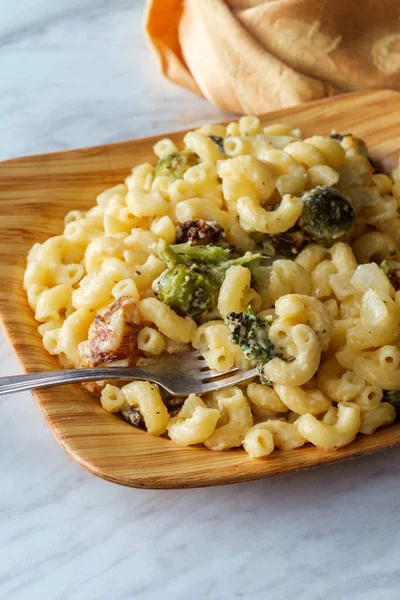 Veggie mac and cheese with roasted brussels sprouts broccoli and cauliflower