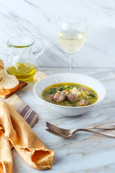 Italian wedding soup with sausage meatballs and orzo pasta