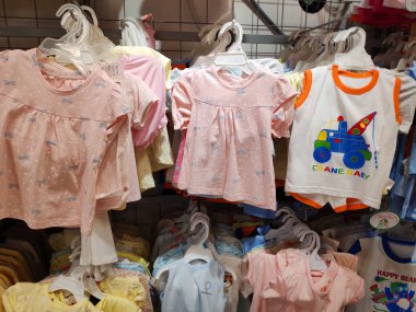 Saigon/Vietnam: 1May 19: Beautiful baby clothes pyjamas infant colorful fashion in supermarket shelf little casual clothing