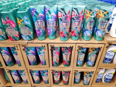Saigon/Vietnam: 1 May 2019: Pantene Clear Rejoice shampoo conditioner big container on supermarket shelf cosmetic beauty product of Unilever