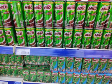 Saigon/Vietnam:1 May 19: Milo can chocolate malt powder mixed with hot water and milk popular beverage Nestle product green tin in supermarket shelf