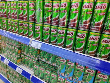 Saigon/Vietnam:1 May 19: Milo can chocolate malt powder mixed with hot water and milk popular beverage Nestle product green tin in supermarket shelf