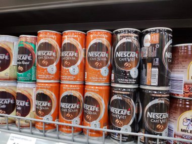 Saigon/Vietnam:1May2019: Nescafe Gold Intense Rich Original Cafe Viet supermarket shelf gold package instant roasted coffee caffeine beverage powder added barista style ground
