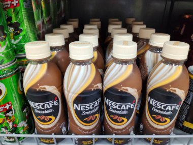Saigon/Vietnam:1May2019: Nescafe Gold Intense Rich Original Cafe Viet supermarket shelf gold package instant roasted coffee caffeine beverage powder added barista style ground