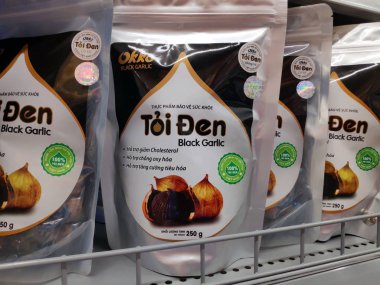 Saigon/Vietnam: 1May 19: Toi Den Toi Co Don Black garlic amino acids antioxidant Asian medical herb ferment garlic good for health in supermarket shelf sweet taste black licorice