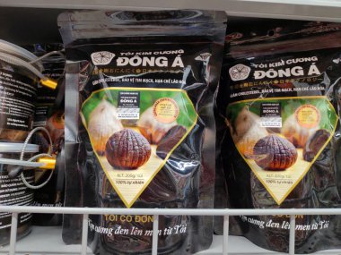Saigon/Vietnam: 1May 19: Toi Den Toi Co Don Black garlic amino acids antioxidant Asian medical herb ferment garlic good for health in supermarket shelf sweet taste black licorice