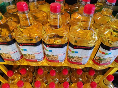 Saigon/Vietnam: 1May19: Simply Cooking oil Vegetable sunflower peanut olive oil in big can in supermarket shelf healthy choice for heart original soy oil for baking cooking.
