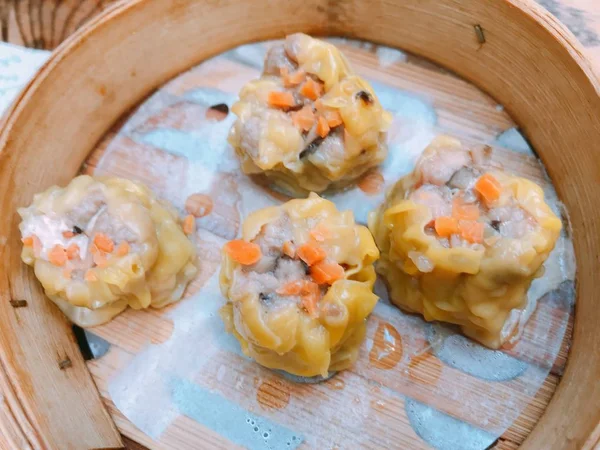 Dim Sum Siu Mai Delicious Asian traditional cuisine with yummy taste and beautiful decoration pork mince carrot black dried mushroom Chinese food steamed dumplings