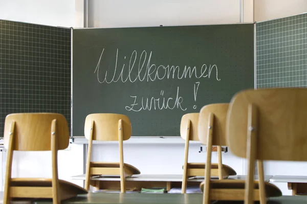 Welcome Back German Language Chalkboard Class Room Stock Photo