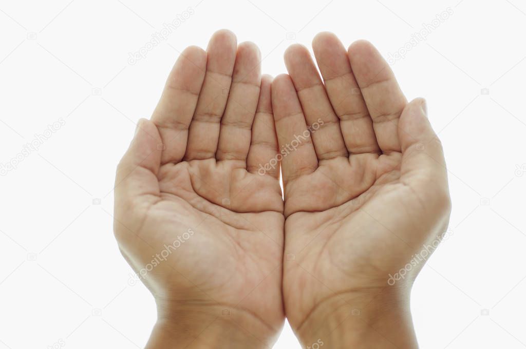 hands cupped together on white background