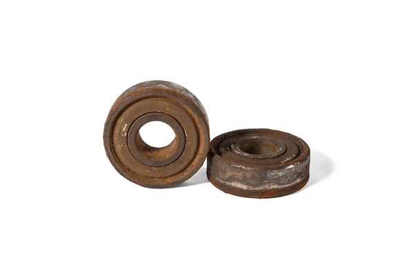 Rusty stuck ball bearings on a white background isolated — Stock Photo, Image