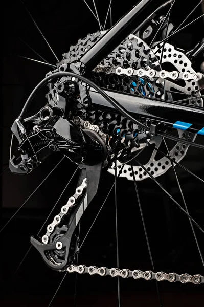 Mountain bicycle gears system on dark background — Stock Photo, Image