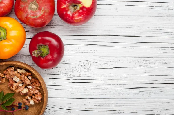Organic farm tomatoes and sweet pepper on wooden background  top — Stock Photo, Image