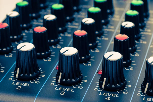 mixing console knobs close-up