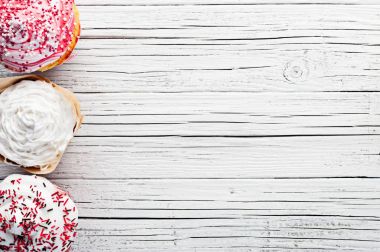 cupcakes Beyaz ahşap arka plan üstten görünüm üzerinde çeşitli