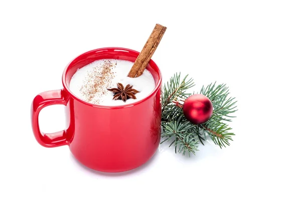 Eggnog cocktail in red mug arranged with christmas decoration is — Stock Photo, Image