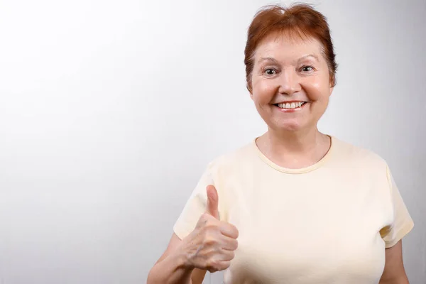 Beautiful Senior Woman Looks Surprise Frame White Background Light Shirt — Stock Photo, Image