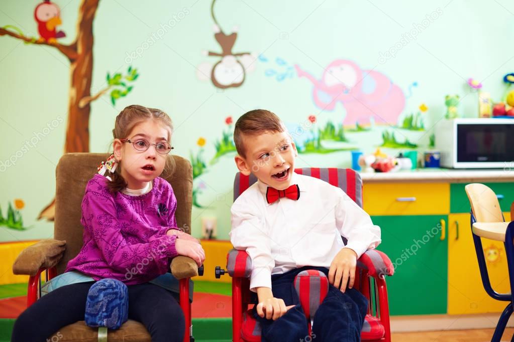 cute kids in wheelchairs at kindergarten for children with special needs