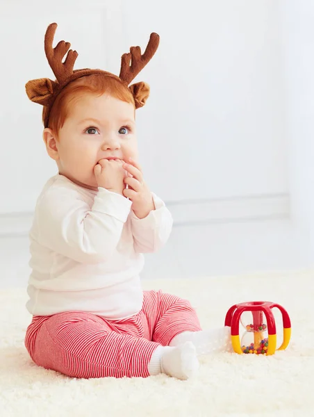 Beautiful baby dear playing with toy at home — Stock Photo, Image