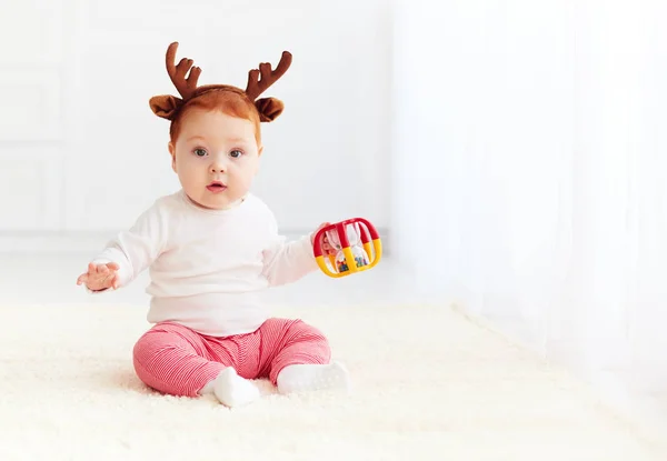 Beautiful baby dear playing with toy at home — Stock Photo, Image